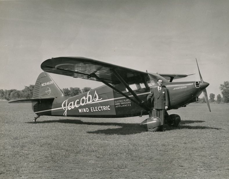 Marcellus Jacobs in front of the company airplane in the early 50s Marcellus next to Jacobs Wind Airplane