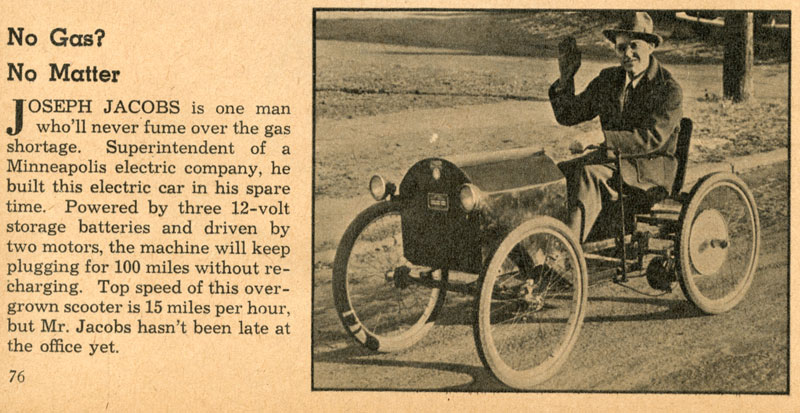 A Photograph of Joe Jacobs in an electric car he personally built for transportation. It came in handy during the gas rationing of WWII